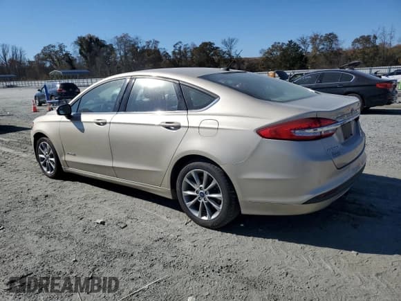 ✅ 2017 Ford Fusion Hybrid SE • VIN: 3FA6P0LU6HR203853 • Lot: 92791745. Listed on Copart with 116,769 mi. Free auction sales archive from the USA and detailed vehicle history report at DreamBid. Image 2.