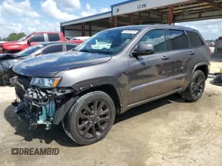 2018 Jeep Grand Cherokee Laredo E with VIN 1C4RJEAG9JC228057, listed as a Copart auction lot 85499245 with 66,068 mi miles and Salvage title. Bid and sale history available at DreamBid. Image 1.