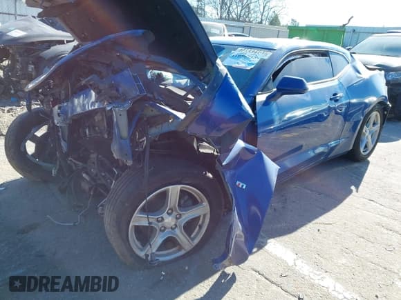 ✅ 2021 Chevrolet Camaro 1LS • VIN: 1G1FB1RX3M0128032 • Lot: 41050713. Listed on IAAI with 58,255 mi. Free auction sales archive from the USA and detailed vehicle history report at DreamBid. Image 2.