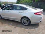 ✅ 2013 Ford Fusion Titanium Hybrid • VIN: 3FA6P0RU7DR281902 • Лот: 42130457. Опубликован ранее на IAAI с пробегом 148 677 миль. Бесплатный доступ к архиву аукционных продаж из США и подробный отчёт об истории автомобиля на DreamBid. Изображение 3.