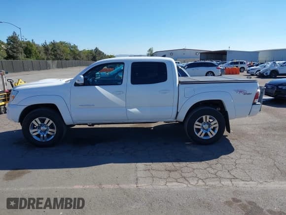 ✅ 2012 Toyota Tacoma • VIN: 3TMLU4EN6CM089216 • Lot: 43336629. Listed on IAAI with 135,350 mi. Free auction sales archive from the USA and detailed vehicle history report at DreamBid. Image 15.