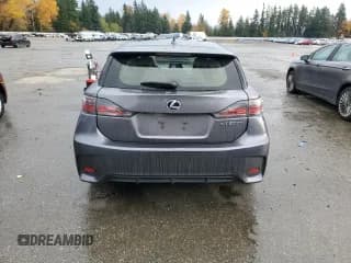 ✅ 2015 Lexus CT 200h • VIN: JTHKD5BH3F2234951 • Лот: 91750235. Опубликован ранее на Copart с пробегом 103 914 миль. Бесплатный доступ к архиву аукционных продаж из США и подробный отчёт об истории автомобиля на DreamBid. Изображение 6.