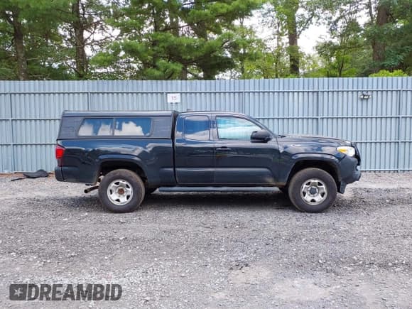 ✅ 2020 Toyota Tacoma SR • VIN: 3TYSX5ENXLT001202 • Lot: 42781126. Listed on IAAI with 250,016 mi. Free auction sales archive from the USA and detailed vehicle history report at DreamBid. Image 13.