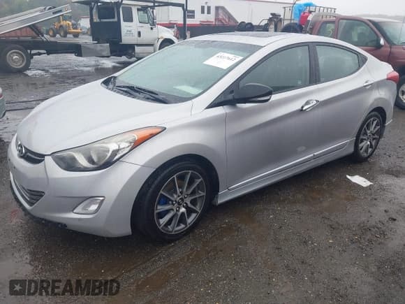✅ 2013 Hyundai Elantra GLS • VIN: KMHDH4AE1DU559210 • Lot: 43217612. Listed on IAAI with 106,194 mi. Free auction sales archive from the USA and detailed vehicle history report at DreamBid. Image 2.