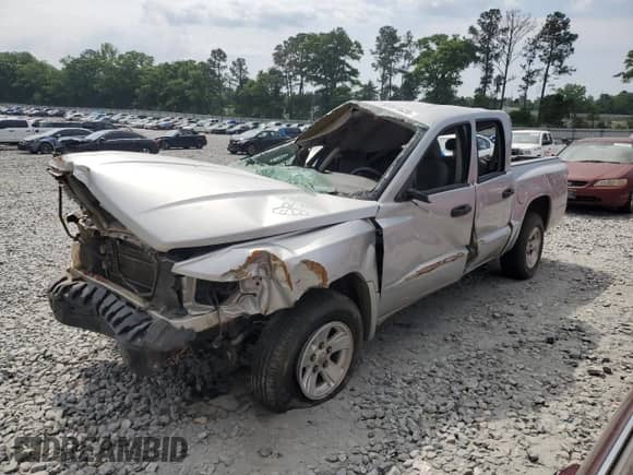 2008 Dodge Dakota SLT с VIN 1D7HE48K18S514754, выставлен на аукционе Copart как лот 52281525 с пробегом Не указан миль и Чистый • Clean title. История ставок и продаж доступна на DreamBid. Изображение 1.