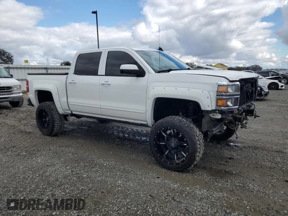 ✅ 2015 Chevrolet Silverado 1500 LT • VIN: 3GCUKREC7FG204740 • Lot: 86334975. Listed on Copart with 48,473 mi. Free auction sales archive from the USA and detailed vehicle history report at DreamBid. Image 4.