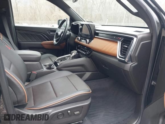 ✅ 2023 GMC Canyon 4WD AT4 • VIN: 1GTP6DEK9P1151776 • Lot: 41655533. Listed on IAAI with 11,750 mi. Free auction sales archive from the USA and detailed vehicle history report at DreamBid. Image 5.