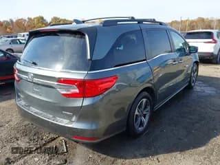 ✅ 2018 Honda Odyssey Touring • VIN: 5FNRL6H85JB044090 • Lot: 43648114. Wystawiony na IAAI z przebiegiem 153 287 mil. Bezpłatny archiwum sprzedaży aukcyjnych z USA i szczegółowy raport historii pojazdu na DreamBid. Zdjęcie 4.