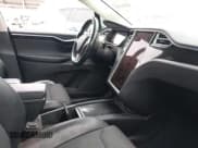 ✅ 2016 Tesla Model X 70D • VIN: 5YJXCBE28GF019371 • Lot: 42444782. Listed on IAAI with 69,612 mi. Free auction sales archive from the USA and detailed vehicle history report at DreamBid. Image 5.