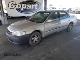 1999 Honda Accord LX z VIN JHMCG6654XC023089, wystawiony jako Copart lot #69421625 z przebiegiem 259 495 mil mil oraz Szkoda całkowita • Salvage title. Historia ofert i sprzedaży dostępna na DreamBid. Obrazek 1.