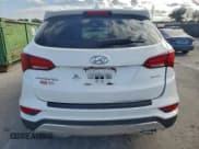✅ 2017 Hyundai Santa Fe 2.4L • VIN: 5XYZT3LB2HG403741 • Лот: 96082615. Опубликован ранее на Copart с пробегом 205 136 миль. Бесплатный доступ к архиву аукционных продаж из США и подробный отчёт об истории автомобиля на DreamBid. Изображение 6.