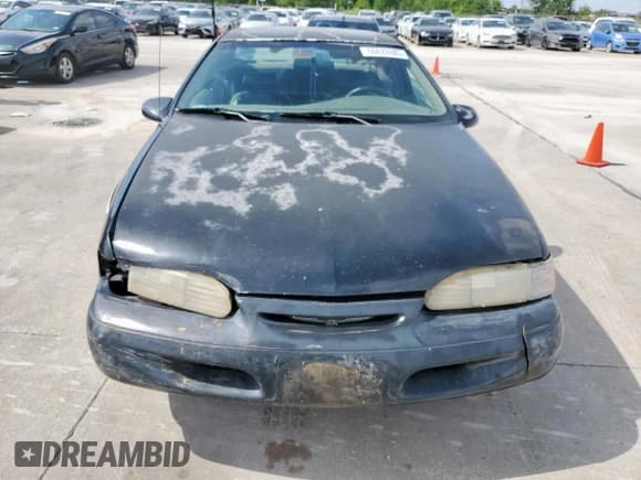 ✅ 1995 Ford Thunderbird LX • VIN: 1FALP62W7SH175725 • Lot: 60622085. Wystawiony na Copart z przebiegiem 77 454 mil. Bezpłatny archiwum sprzedaży aukcyjnych z USA i szczegółowy raport historii pojazdu na DreamBid. Zdjęcie 5.