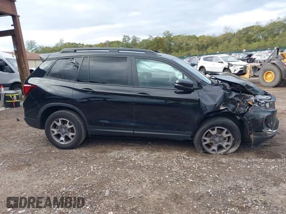 ✅ 2023 Honda Passport TrailSport • VIN: 5FNYF8H62PB040701 • Lot: 43494593. Listed on IAAI with 13,186 mi. Free auction sales archive from the USA and detailed vehicle history report at DreamBid. Image 13.