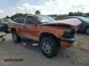 2001 Dodge Dakota Sport z VIN 1B7GG26N31S197440, wystawiony jako Copart lot #68280665 z przebiegiem Nie podano mil oraz Szkoda całkowita • Salvage title. Historia ofert i sprzedaży dostępna na DreamBid. Obrazek 4.