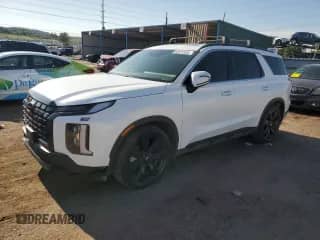 2023 Hyundai Palisade XRT с VIN KM8R3DGE7PU574245, выставлен на аукционе Copart как лот 62574435 с пробегом 74 705 миль миль и Чистый • Clean title. История ставок и продаж доступна на DreamBid. Изображение 1.