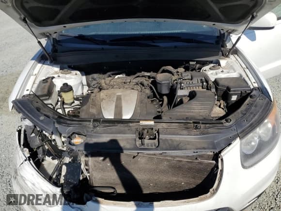 ✅ 2012 Hyundai Santa Fe SE • VIN: 5XYZH4AG4CG110518 • Lot: 77423244. Listed on Copart with 170,903 mi. Free auction sales archive from the USA and detailed vehicle history report at DreamBid. Image 12.