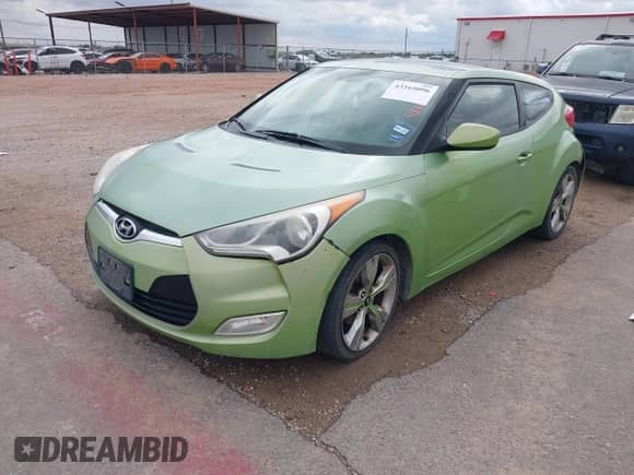 2012 Hyundai Veloster w/Gray Int с VIN KMHTC6AD6CU052668, выставлен на аукционе IAAI как лот 43165096 с пробегом 156 135 миль миль и . История ставок и продаж доступна на DreamBid. Изображение 2.