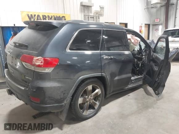 2014 Jeep Grand Cherokee Limited z VIN 1C4RJFBG0EC213215, wystawiony jako IAAI lot #43260723 z przebiegiem Nie podano mil oraz . Historia ofert i sprzedaży dostępna na DreamBid. Obrazek 4.