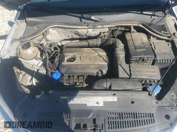 2013 Volkswagen Tiguan S z VIN WVGAV7AX8DW554282, wystawiony jako Copart lot #86422715 z przebiegiem 161 282 mil mil oraz Szkoda całkowita • Salvage title. Historia ofert i sprzedaży dostępna na DreamBid. Obrazek 12.