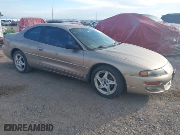 ✅ 1999 Dodge Avenger • VIN: 4B3AU52N1XE147276 • Лот: 43617695. Опубликован ранее на IAAI с пробегом 103 829 миль. Бесплатный доступ к архиву аукционных продаж из США и подробный отчёт об истории автомобиля на DreamBid. Изображение 1.