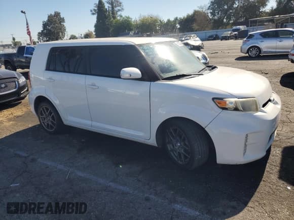 ✅ 2014 Scion xB • VIN: JTLZE4FE6EJ053973 • Lot: 91837235. Listed on Copart with 128,684 mi. Free auction sales archive from the USA and detailed vehicle history report at DreamBid. Image 4.