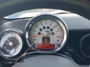 ✅ 2009 MINI Convertible S • VIN: WMWMS33589TG89415 • Лот: 42936018. Опубликован ранее на IAAI с пробегом 99 729 миль. Бесплатный доступ к архиву аукционных продаж из США и подробный отчёт об истории автомобиля на DreamBid. Изображение 7.