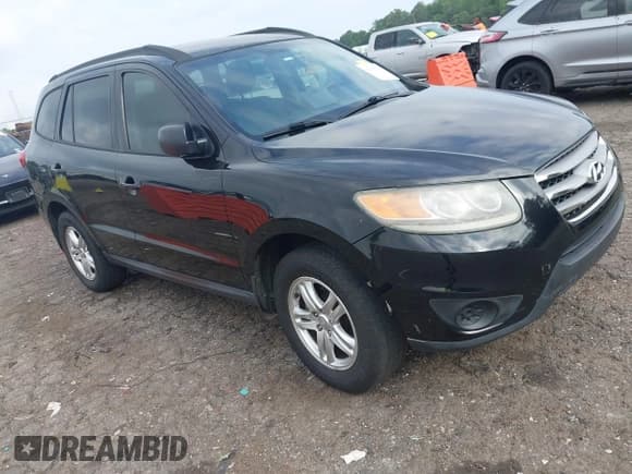✅ 2012 Hyundai Santa Fe GLS • VIN: 5XYZGDAG2CG144556 • Lot: 42596221. Listed on IAAI with 164,813 mi. Free auction sales archive from the USA and detailed vehicle history report at DreamBid. Image 1.