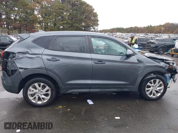 ✅ 2019 Hyundai Tucson SE • VIN: KM8J2CA45KU039689 • Лот: 43497408. Опубликован ранее на IAAI с пробегом 50 508 миль. Бесплатный доступ к архиву аукционных продаж из США и подробный отчёт об истории автомобиля на DreamBid. Изображение 13.