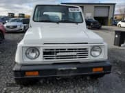 ✅ 1988 Suzuki Samurai • VIN: JS4JC51V1J4151925 • Lot: 90268155. Wystawiony na Copart z przebiegiem 34 590 mil. Bezpłatny archiwum sprzedaży aukcyjnych z USA i szczegółowy raport historii pojazdu na DreamBid. Zdjęcie 5.