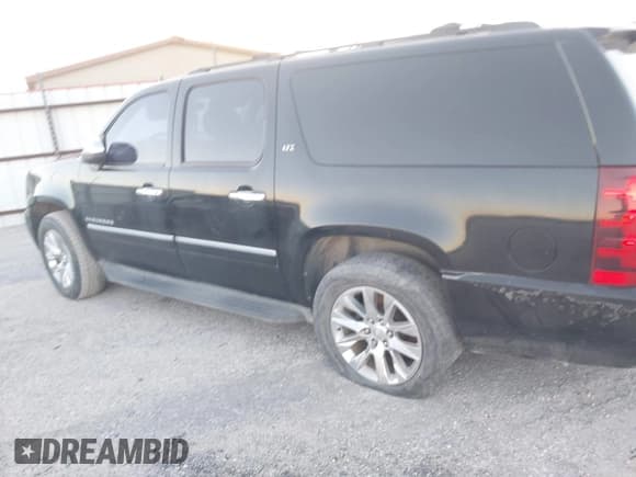 ✅ 2011 Chevrolet Suburban LTZ • VIN: 1GNSCKE04BR167942 • Lot: 43680485. Listed on IAAI with 153,886 mi. Free auction sales archive from the USA and detailed vehicle history report at DreamBid. Image 14.