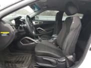 ✅ 2016 Hyundai Veloster • VIN: KMHTC6ADXGU278816 • Lot: 76687833. Wystawiony na Copart z przebiegiem 80 242 mil. Bezpłatny archiwum sprzedaży aukcyjnych z USA i szczegółowy raport historii pojazdu na DreamBid. Zdjęcie 7.