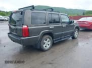 ✅ 2006 Jeep Commander • VIN: 1J8HG48N46C274341 • Lot: 42264428. Listed on IAAI with 153,443 mi. Free auction sales archive from the USA and detailed vehicle history report at DreamBid. Image 4.