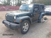 ✅ 2010 Jeep Wrangler Mountain • VIN: 1J4AA2D15AL233298 • Lot: 43615688. Listed on IAAI with 163,076 mi. Free auction sales archive from the USA and detailed vehicle history report at DreamBid. Image 17.