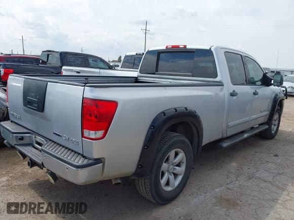 ✅ 2011 Nissan Titan • VIN: 1N6BA0FCXBN309162 • Lot: 42972161. Listed on IAAI with 336,992 mi. Free auction sales archive from the USA and detailed vehicle history report at DreamBid. Image 4.