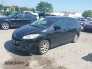 ✅ 2012 Mazda 5 Touring • VIN: JM1CW2CL5C0111869 • Lot: 42581945. Listed on IAAI with 98,909 mi. Free auction sales archive from the USA and detailed vehicle history report at DreamBid. Image 17.