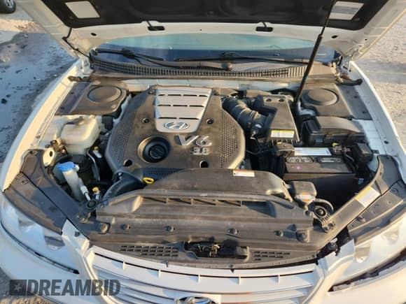 2007 Hyundai Azera SE с VIN KMHFC46F47A203140, выставлен на аукционе Copart как лот 62090625 с пробегом 65 407 миль миль и Списание • Salvage title. История ставок и продаж доступна на DreamBid. Изображение 11.