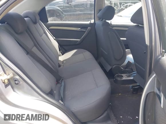 ✅ 2007 Chevrolet Aveo LS • VIN: KL1TD56687B061158 • Lot: 42360261. Wystawiony na IAAI z przebiegiem 74 079 mil. Bezpłatny archiwum sprzedaży aukcyjnych z USA i szczegółowy raport historii pojazdu na DreamBid. Zdjęcie 8.