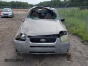 ✅ 2001 Ford Escape XLT • VIN: 1FMYU031X1KA35450 • Lot: 42747825. Listed on IAAI with 206,900 mi. Free auction sales archive from the USA and detailed vehicle history report at DreamBid. Image 13.