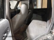 ✅ 1998 Jeep Cherokee Sport • VIN: 1J4FJ68S2WL142027 • Lot: 42305669. Listed on IAAI with 249,580 mi. Free auction sales archive from the USA and detailed vehicle history report at DreamBid. Image 8.