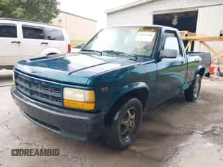 1995 Dodge Dakota SLT z VIN 1B7FL26X5SW942983, wystawiony jako IAAI lot #43511580 z przebiegiem 134 711 mil mil oraz . Historia ofert i sprzedaży dostępna na DreamBid. Obrazek 2.