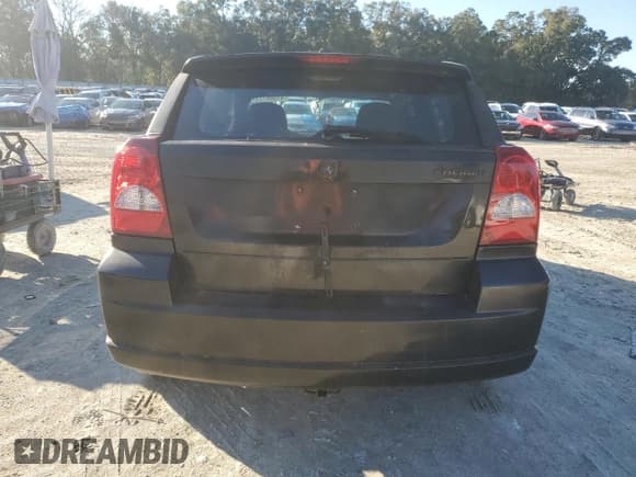 ✅ 2012 Dodge Caliber SXT • VIN: 1C3CDWDA4CD510411 • Лот: 41508725. Опубликован ранее на Copart с пробегом 97 328 миль. Бесплатный доступ к архиву аукционных продаж из США и подробный отчёт об истории автомобиля на DreamBid. Изображение 6.