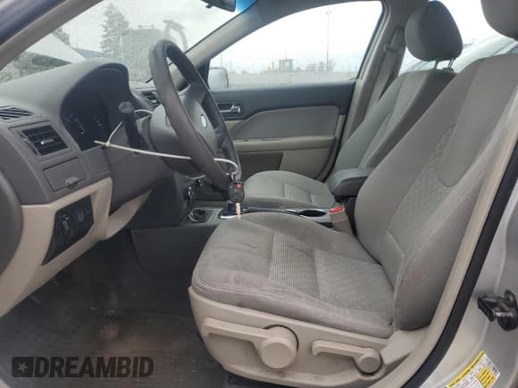 ✅ 2012 Ford Fusion S • VIN: 3FAHP0GA1CR129890 • Lot: 90588835. Wystawiony na Copart z przebiegiem 205 033 mil. Bezpłatny archiwum sprzedaży aukcyjnych z USA i szczegółowy raport historii pojazdu na DreamBid. Zdjęcie 7.