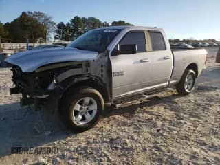 2018 Ram 1500 SLT with VIN 1C6RR7GG0JS307206, listed as a Copart auction lot 79773284 with 122,974 mi miles and Salvage title. Bid and sale history available at DreamBid. Image 1.