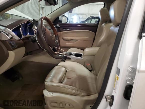 ✅ 2010 Cadillac SRX Premium Collection • VIN: 3GYFNFEYXAS591794 • Lot: 51796625. Wystawiony na Copart z przebiegiem 215 002 mil. Bezpłatny archiwum sprzedaży aukcyjnych z USA i szczegółowy raport historii pojazdu na DreamBid. Zdjęcie 7.
