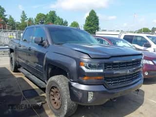 2016 Chevrolet Silverado 1500 LT z VIN 3GCUKREC5GG124502, wystawiony jako IAAI lot #42727541 z przebiegiem Nie podano mil oraz . Historia ofert i sprzedaży dostępna na DreamBid. Obrazek 1.