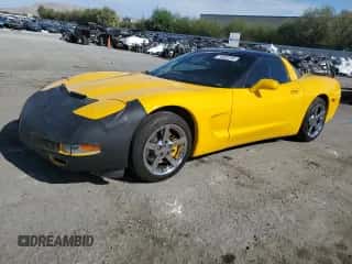 2004 Chevrolet Corvette z VIN 1G1YY22G345124833, wystawiony jako Copart lot #70002304 z przebiegiem 78 083 mil mil oraz Szkoda całkowita • Salvage title. Historia ofert i sprzedaży dostępna na DreamBid. Obrazek 1.