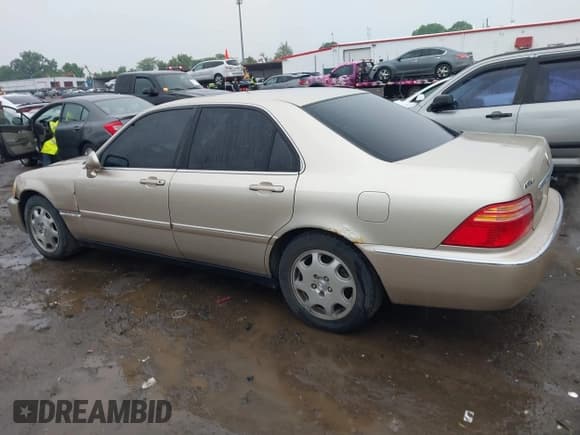 ✅ 1999 Acura RL • VIN: JH4KA9650XC007809 • Lot: 42367106. Listed on IAAI with 222,000 mi. Free auction sales archive from the USA and detailed vehicle history report at DreamBid. Image 14.