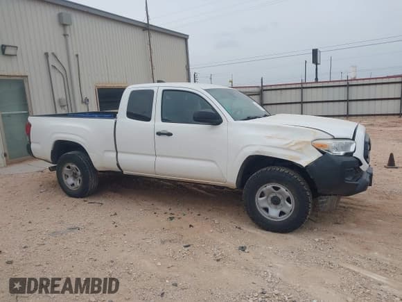 ✅ 2021 Toyota Tacoma SR • VIN: 3TYSX5EN5MT008186 • Lot: 43727033. Listed on IAAI with 91,339 mi. Free auction sales archive from the USA and detailed vehicle history report at DreamBid. Image 13.