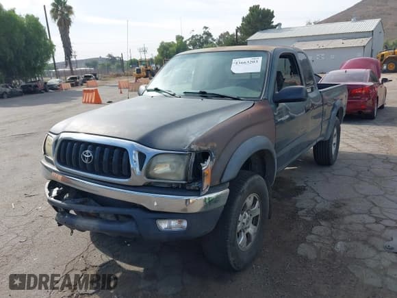 ✅ 2002 Toyota Tacoma PreRunner • VIN: 5TESM92N52Z143121 • Lot: 43663203. Listed on IAAI with 313,284 mi. Free auction sales archive from the USA and detailed vehicle history report at DreamBid. Image 2.