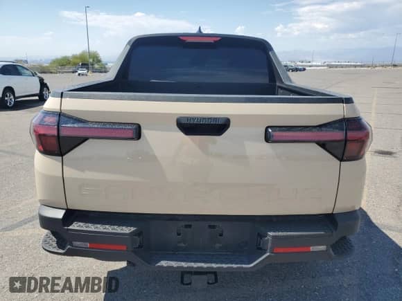 2022 Hyundai Santa Cruz SEL с VIN 5NTJB4AE6NH007563, выставлен на аукционе Copart как лот 70716154 с пробегом 18 023 миль миль и Списание • Salvage title. История ставок и продаж доступна на DreamBid. Изображение 6.